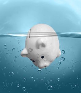 Piggy bank floating in water